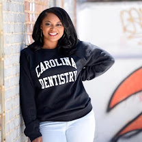 Dr. Hawkins wearing her Carolina Dentistry sweatshirt